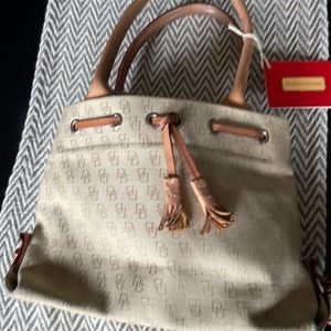 Dooney and Bourke Mini Tassel Tote in tan